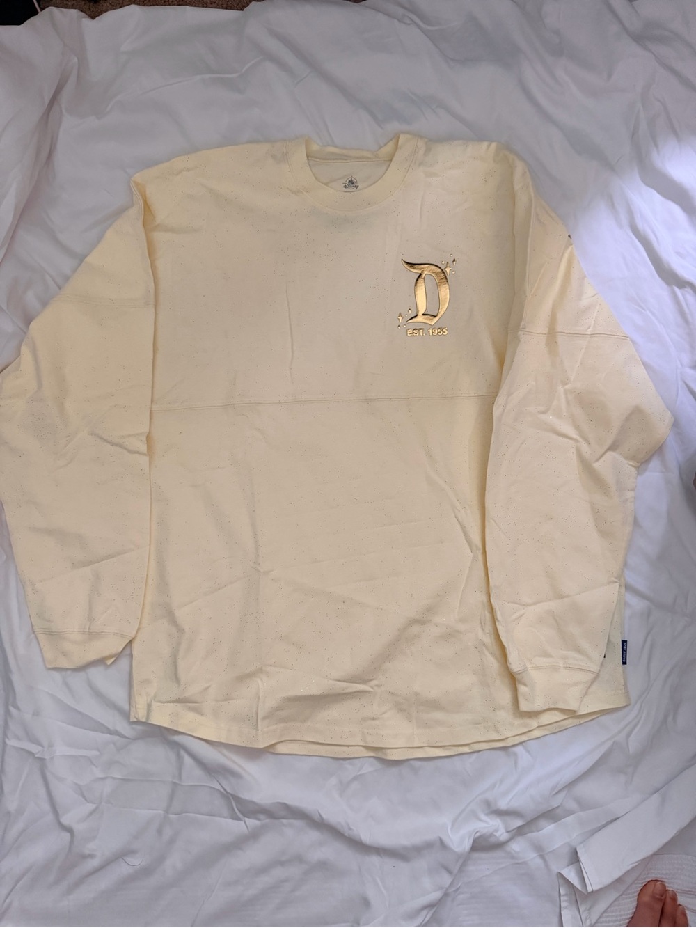 Disneyland Resort Spirit Jersey Cream Gold Lettering Sparkle Print
